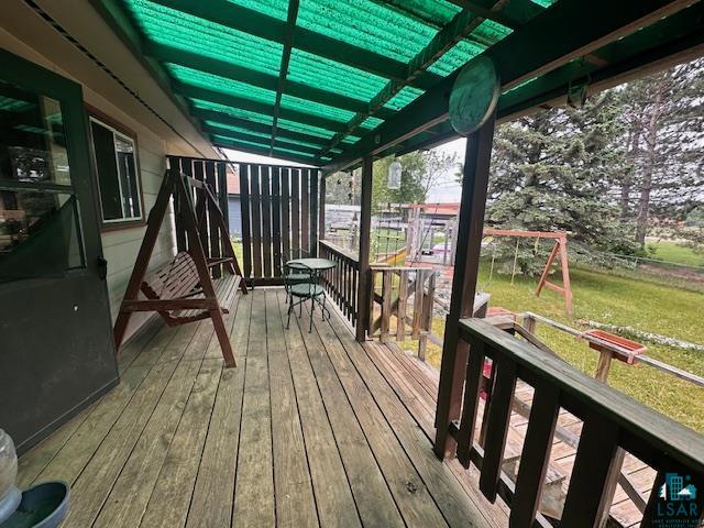 38 Locust Drive Babbitt, MN 55706 - Photo 21 of 29 Wooden deck featuring a yard