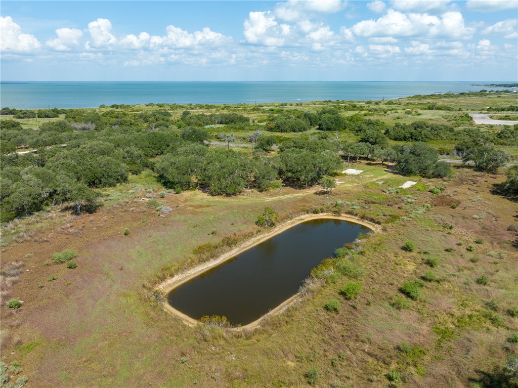1030 Airport Road Rockport, TX 78382 - Photo 2 of 10 a view of beach and ocean