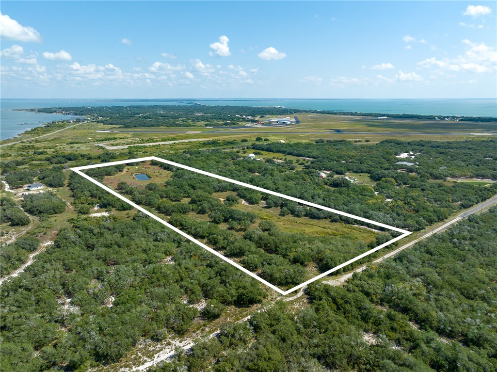 1030 Airport Road Rockport, TX 78382 - Photo 7 of 10 a view of a tennis court