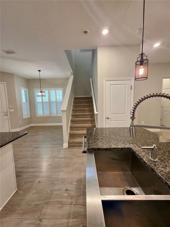 8582 Powder Ridge Trail Windermere, FL 34786 - Photo 11 of 50 a view of entryway and hall with wooden floor