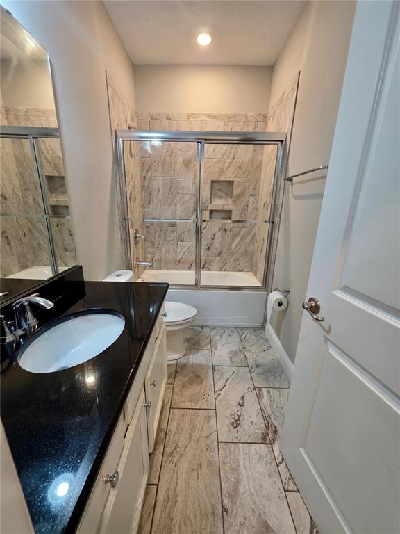 8582 Powder Ridge Trail Windermere, FL 34786 - Photo 24 of 50 a bathroom with a sink and a mirror