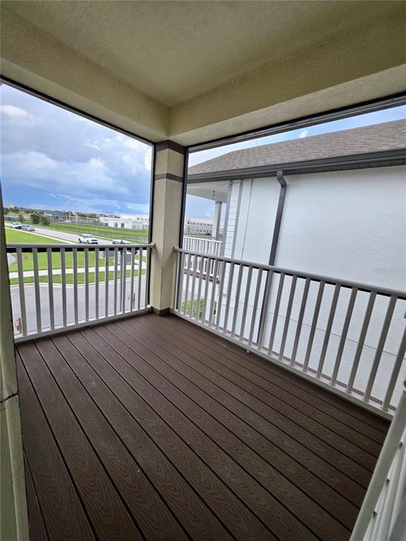 8582 Powder Ridge Trail Windermere, FL 34786 - Photo 31 of 50 a view of deck with wooden floor and fence