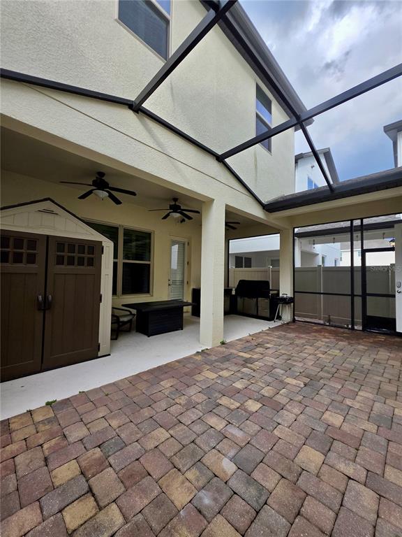 8582 Powder Ridge Trail Windermere, FL 34786 - Photo 34 of 50 a view of a car garage door