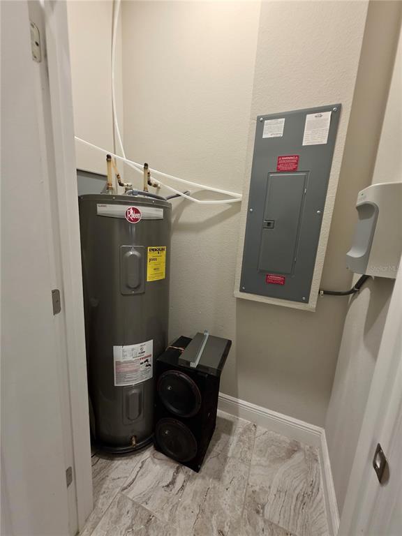 8582 Powder Ridge Trail Windermere, FL 34786 - Photo 46 of 50 a view of storage and utility room with two washing machine