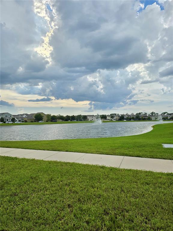8582 Powder Ridge Trail Windermere, FL 34786 - Photo 49 of 50 a view of a golf course with a lake