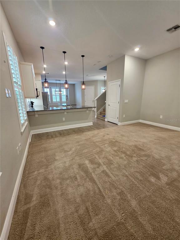 8582 Powder Ridge Trail Windermere, FL 34786 - Photo 10 of 50 a view of a room with kitchen and a window