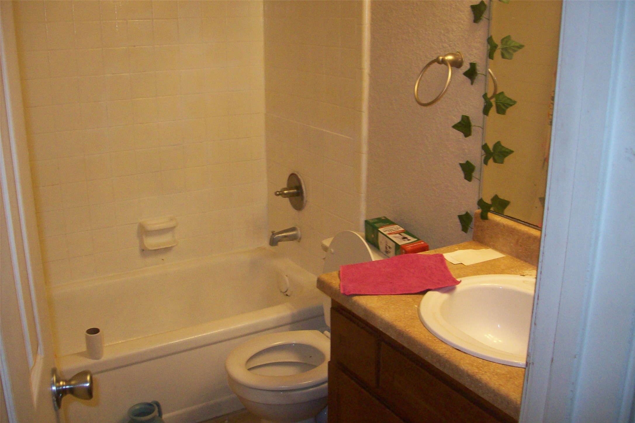 8100 Creekbend Drive, Unit 149 Houston, TX 77071 - Photo 6 of 8 a bathroom with a sink toilet and shower