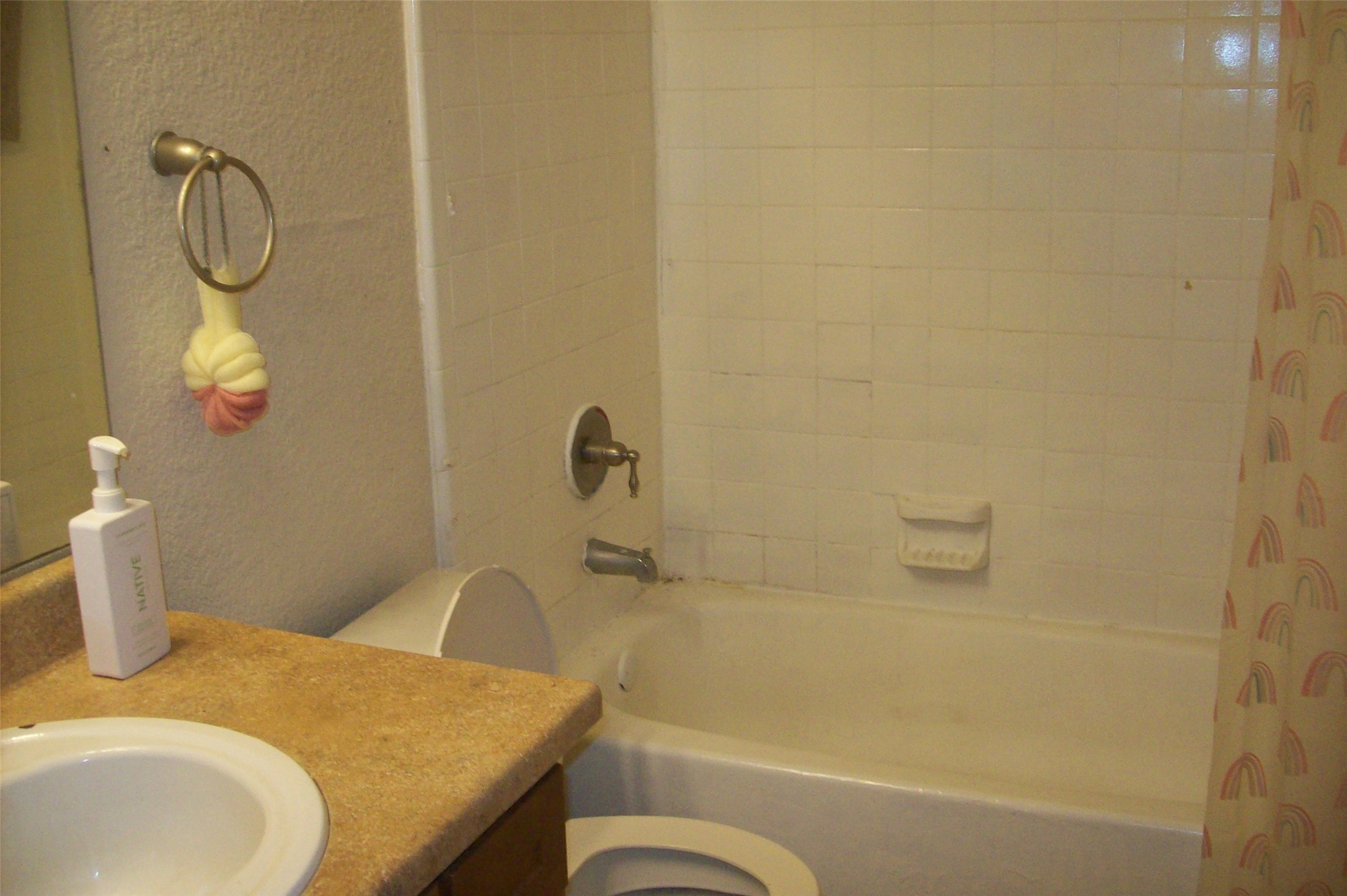8100 Creekbend Drive, Unit 149 Houston, TX 77071 - Photo 8 of 8 a bathroom with a granite countertop sink and a mirror