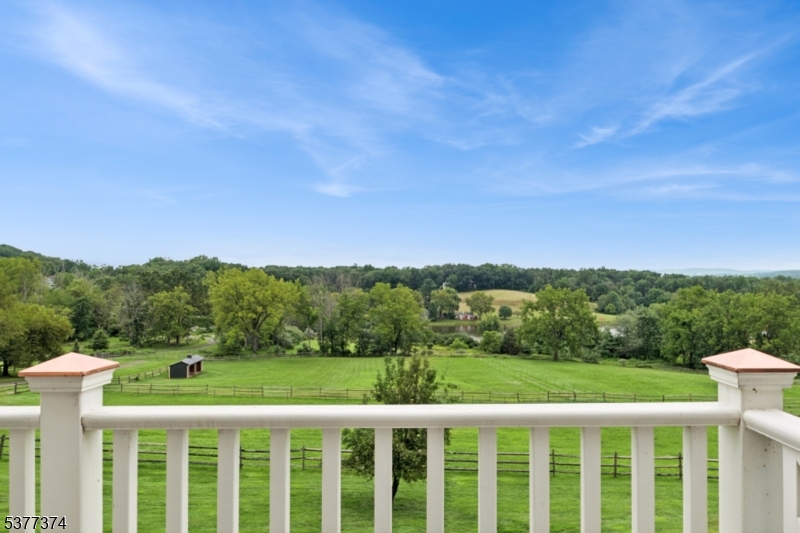 23 Spring Hill Road Annandale, NJ 08801 - Photo 19 of 48 a view of a city with lush green forest