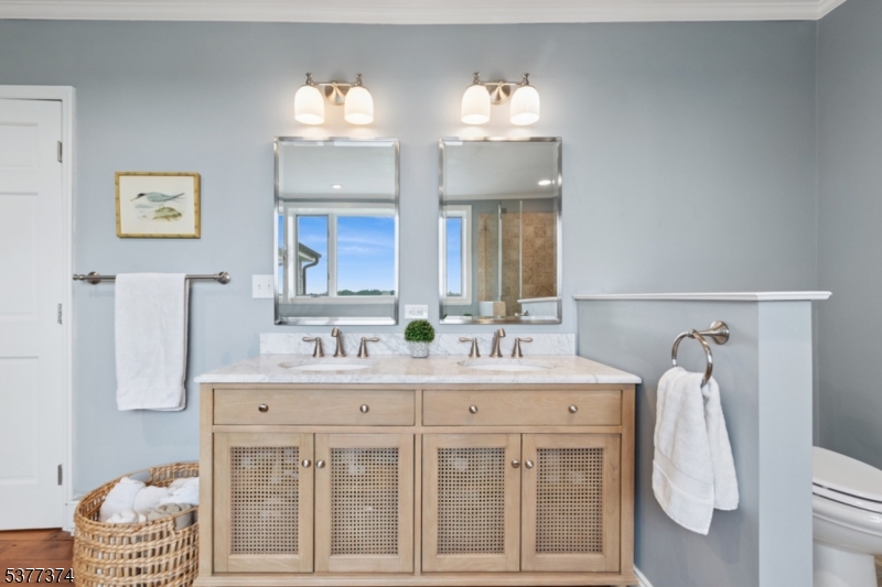 23 Spring Hill Road Annandale, NJ 08801 - Photo 23 of 48 a spacious bathroom with a double vanity sink and a mirror