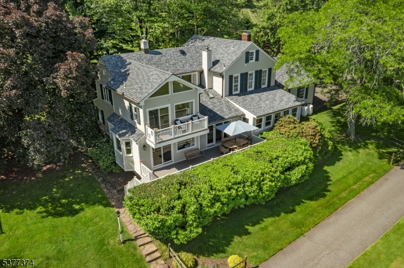 23 Spring Hill Road Annandale, NJ 08801 - Photo 28 of 48 an aerial view of a house with a big yard and large trees
