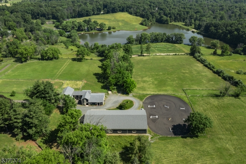 23 Spring Hill Road Annandale, NJ 08801 - Photo 36 of 48 an aerial view of a house with a garden