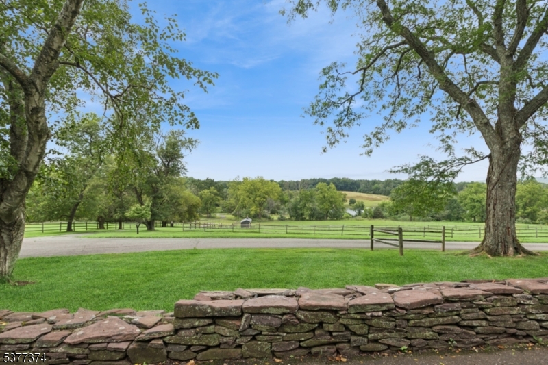 23 Spring Hill Road Annandale, NJ 08801 - Photo 44 of 48 a view of a golf course with a road