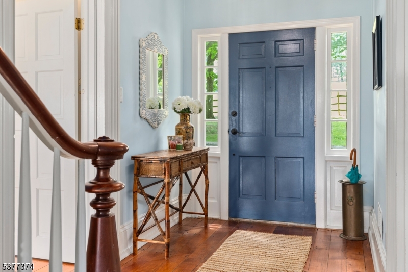 23 Spring Hill Road Annandale, NJ 08801 - Photo 5 of 48 a view of hallway with wooden floor and stairs