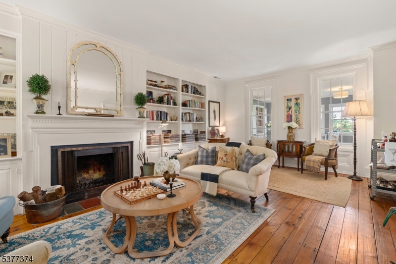 23 Spring Hill Road Annandale, NJ 08801 - Photo 7 of 48 a living room with furniture and a fireplace