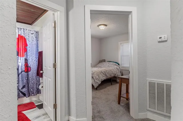 a en suite bathroom with a sink and a mirror