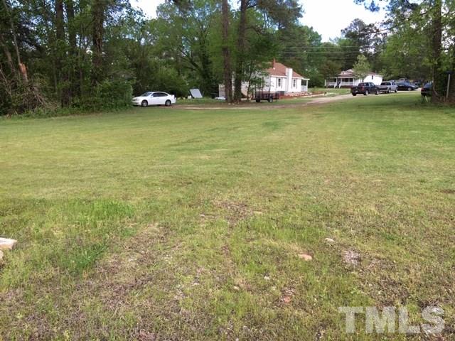 224 New Rand Road Garner, NC 27529 - Photo 1 of 1 a swimming pool with outdoor seating and yard