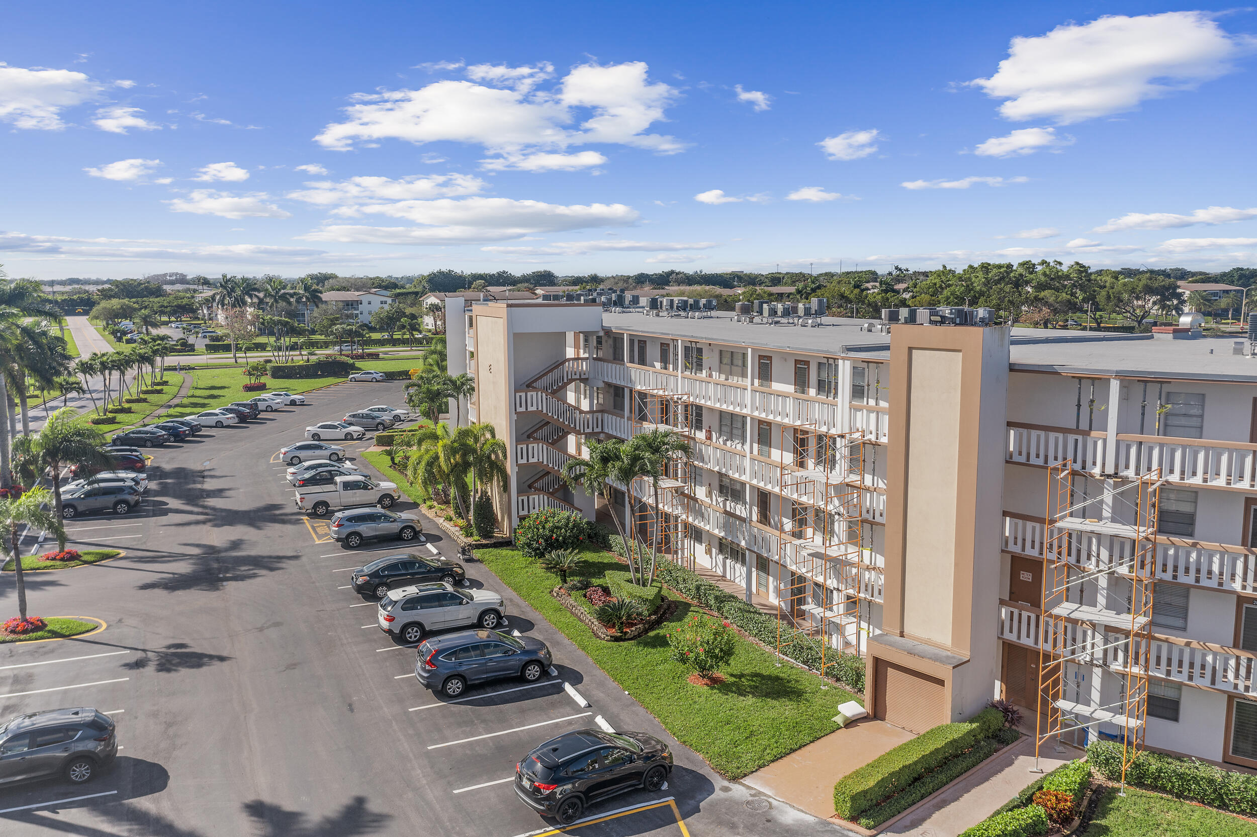 3089 Cornwall East, Unit E Boca Raton, FL 33434 - Photo 32 of 39 a view of a city with tall buildings