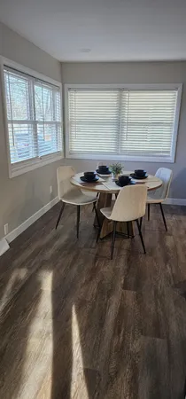 a workspace with furniture and window