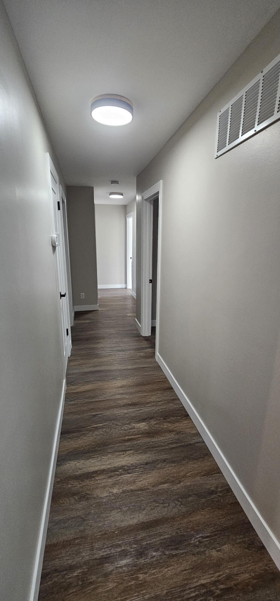 103 Michigan Street Chesterton, IN 46304 - Photo 22 of 46 a view of a hallway with wooden floor