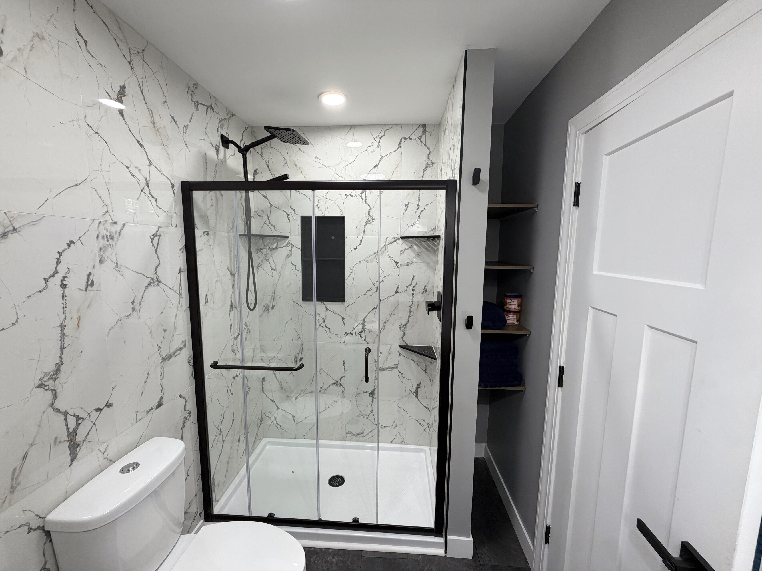 103 Michigan Street Chesterton, IN 46304 - Photo 30 of 46 a bathroom with a shower toilet and sink