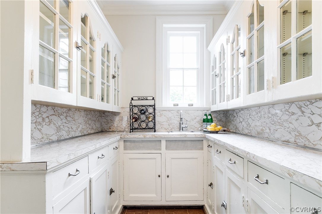 207 Nottingham Road Richmond, VA 23221 - Photo 15 of 49 a kitchen with granite countertop white cabinets and white appliances