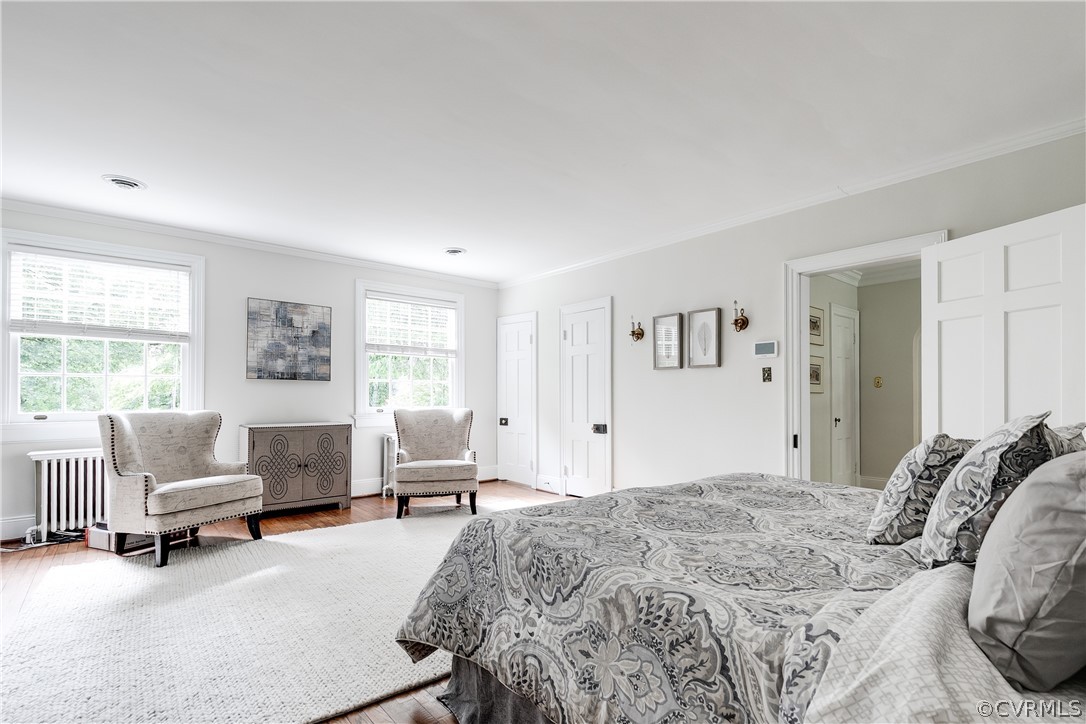 207 Nottingham Road Richmond, VA 23221 - Photo 27 of 49 a spacious bedroom with a bed a couch and a couch