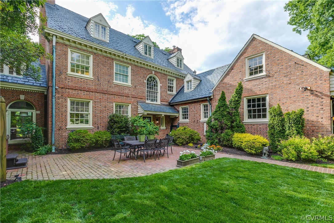 207 Nottingham Road Richmond, VA 23221 - Photo 39 of 49 a front view of a house with a yard and porch