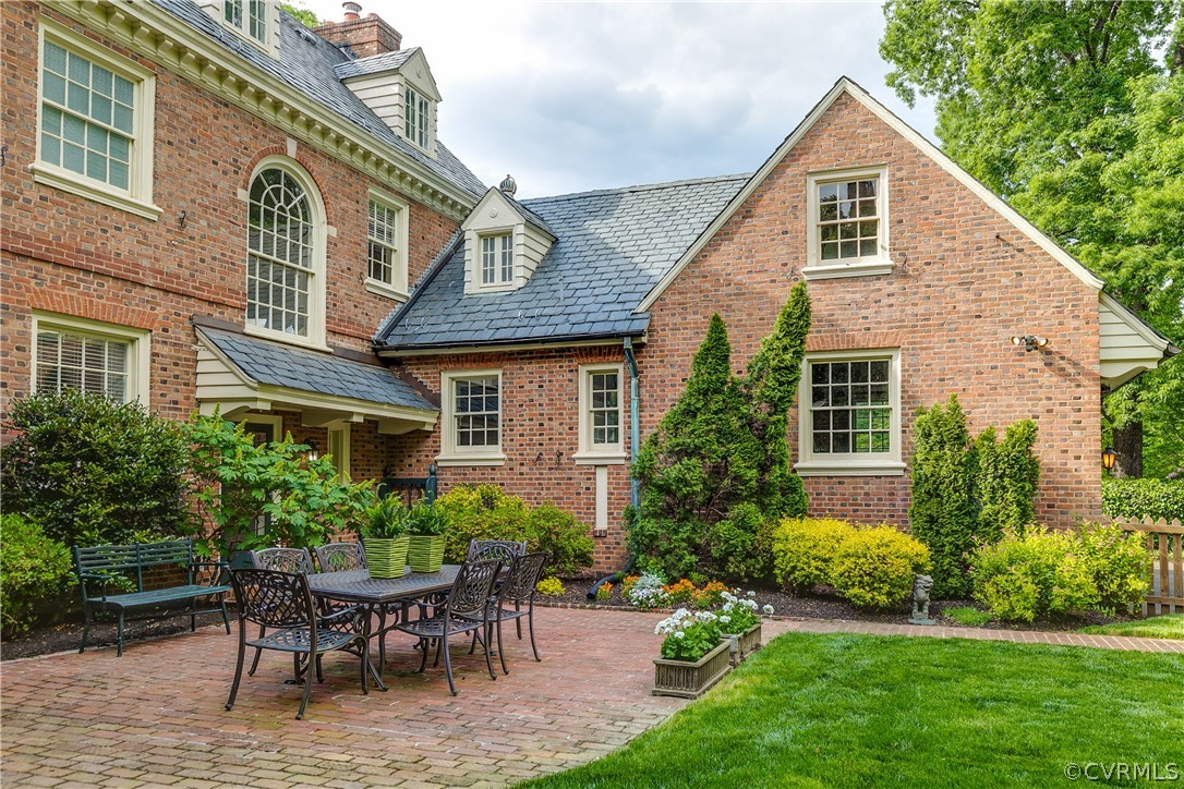 207 Nottingham Road Richmond, VA 23221 - Photo 40 of 49 a backyard of a house with a garden and barbeque oven