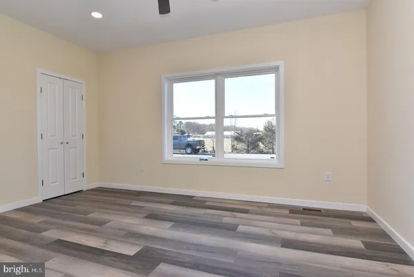 a view of a room that has a window in it