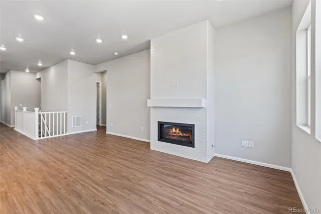 a view of kitchen with wooden floor