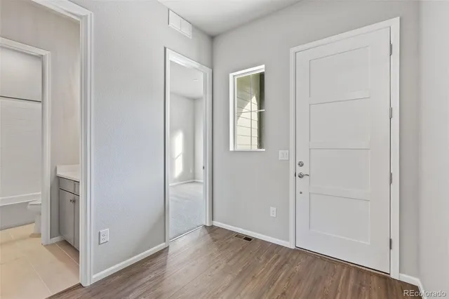 an empty room with windows