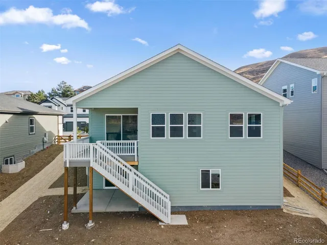 a house view with a backyard space