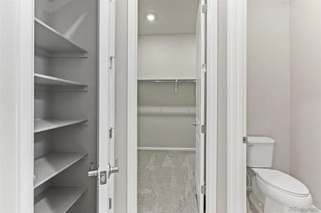 a view of a room with racks on the wall