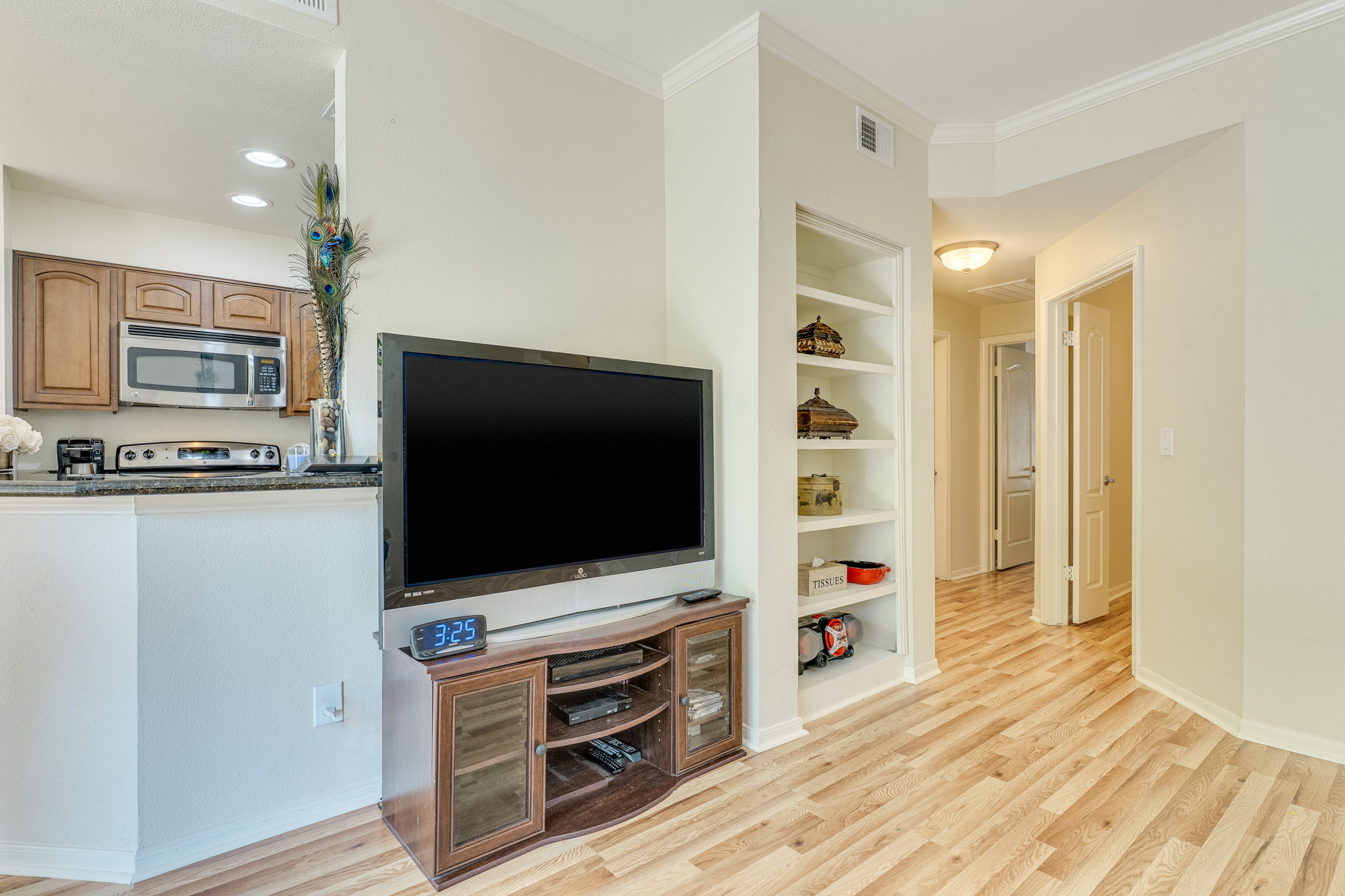 6000 Shepherd Mountain Cove, Unit 807 Austin, TX 78730 - Photo 13 of 38 Living room with new wood laminate flooring .