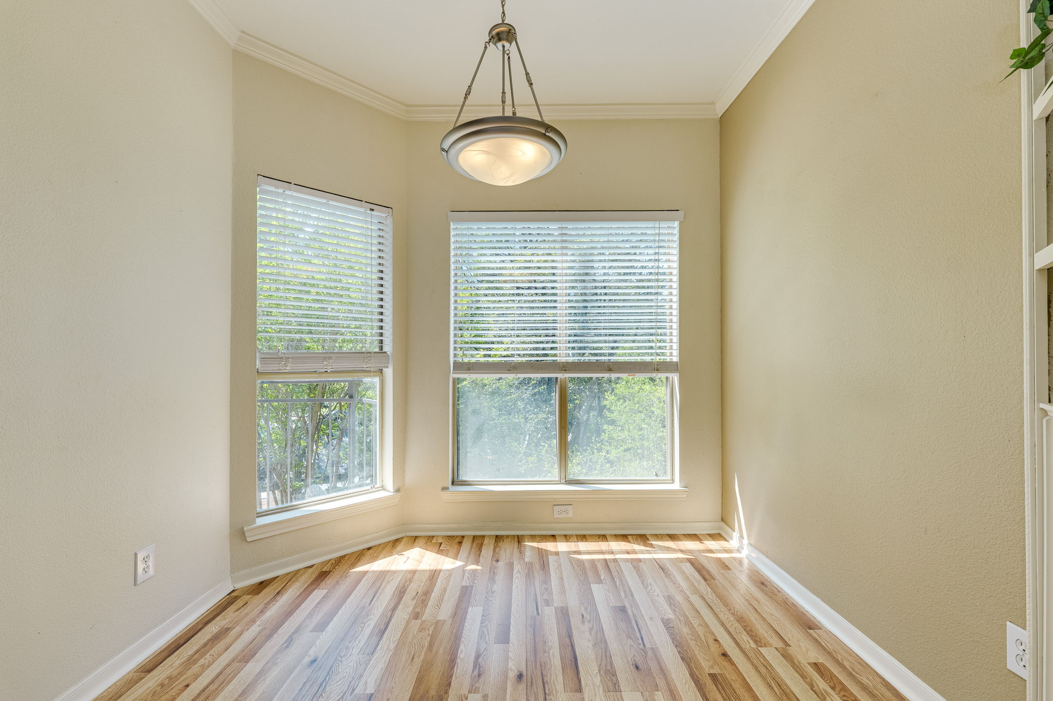 6000 Shepherd Mountain Cove, Unit 807 Austin, TX 78730 - Photo 16 of 38 Unfurnished dining area with new wood laminate floors.