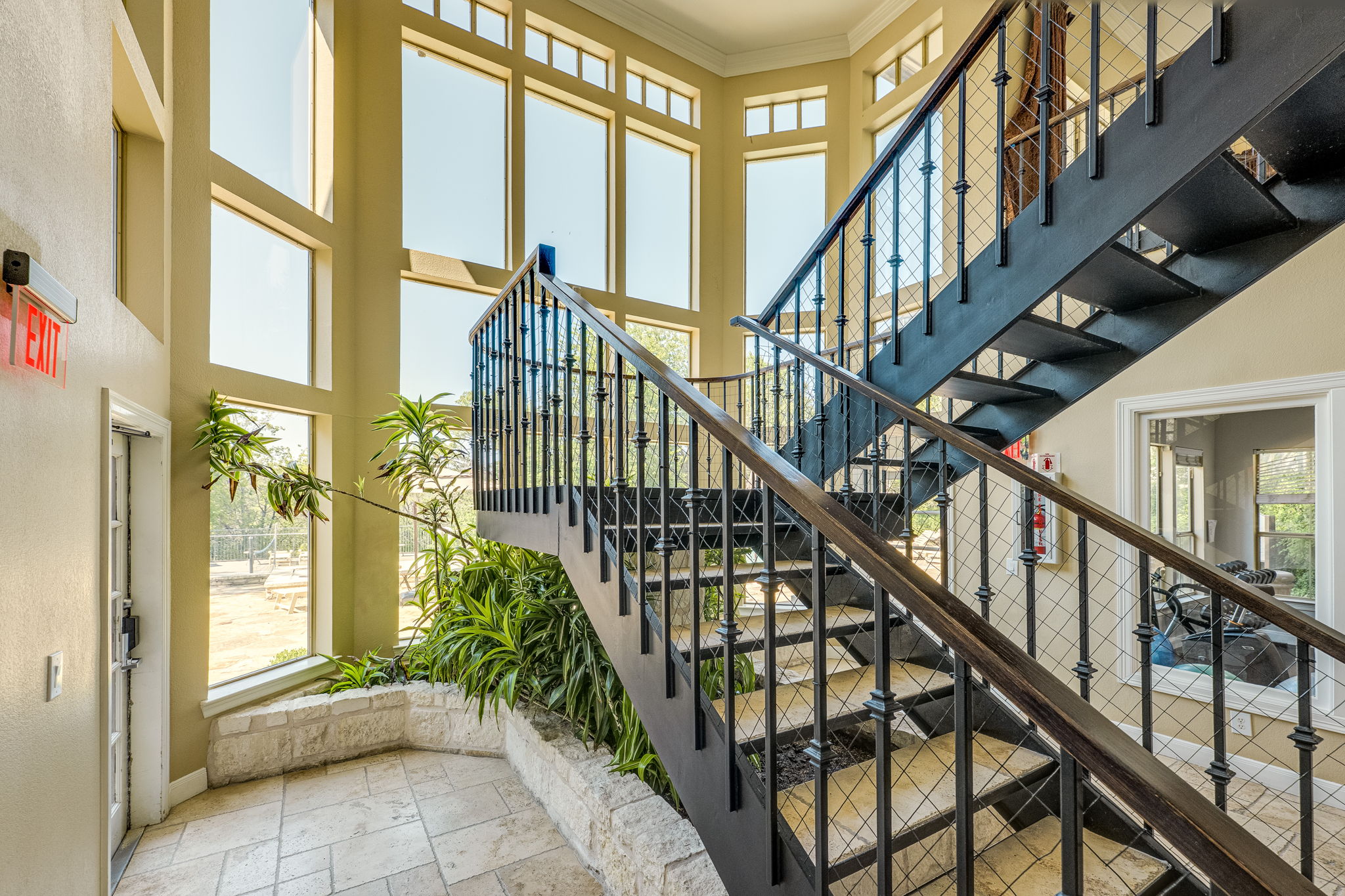 6000 Shepherd Mountain Cove, Unit 807 Austin, TX 78730 - Photo 27 of 38 Staircase with stone tile floors, By workout area.