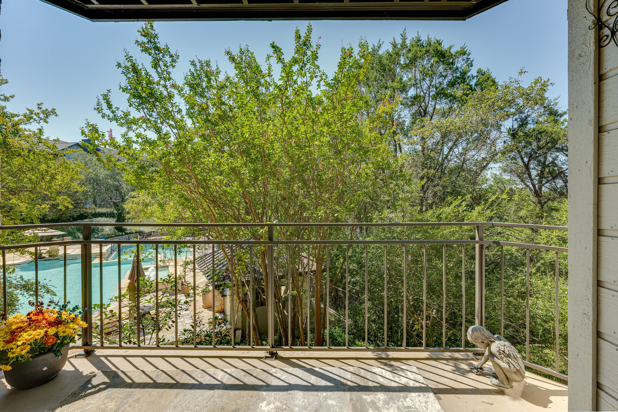 6000 Shepherd Mountain Cove, Unit 807 Austin, TX 78730 - Photo 33 of 38 Balcony off of the living room featuring view of pool.
