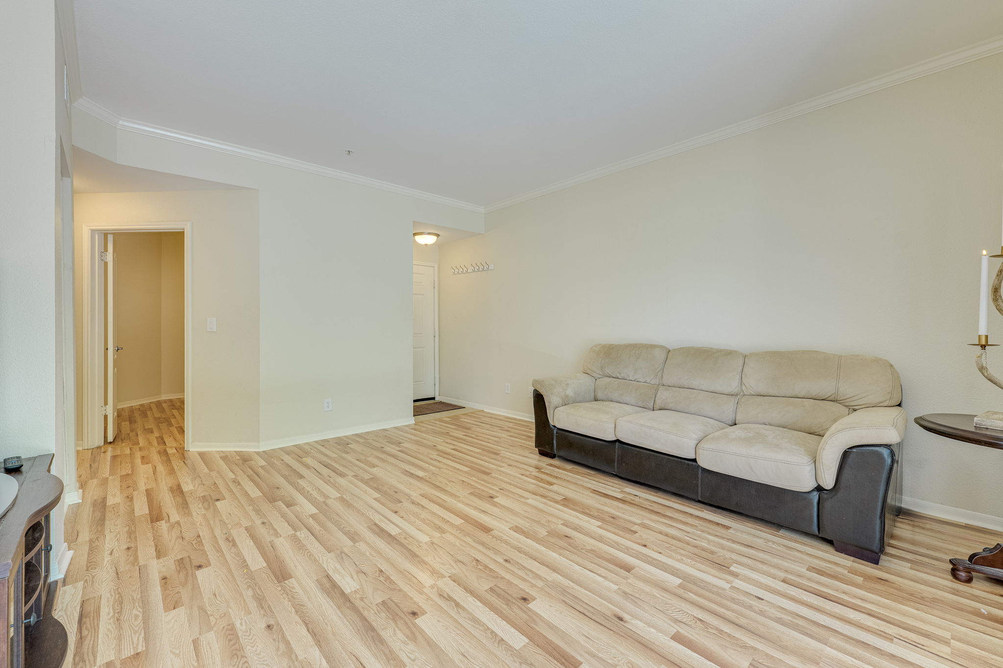 6000 Shepherd Mountain Cove, Unit 807 Austin, TX 78730 - Photo 8 of 38 Living room with new wood laminate flooring.
