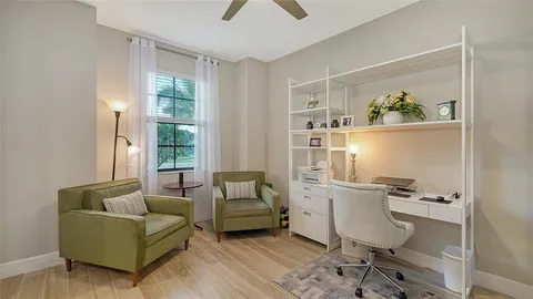 a kitchen with stainless steel appliances granite countertop sink stove refrigerator and cabinets