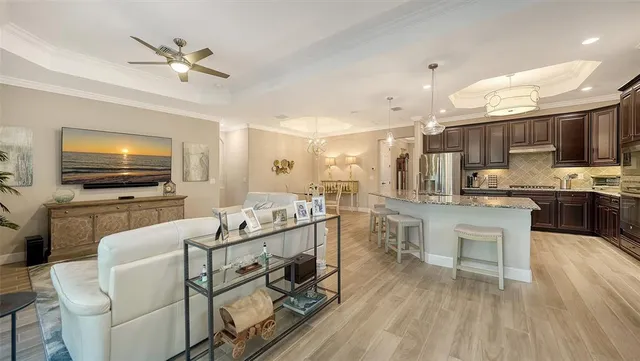 a kitchen with stove and cabinets