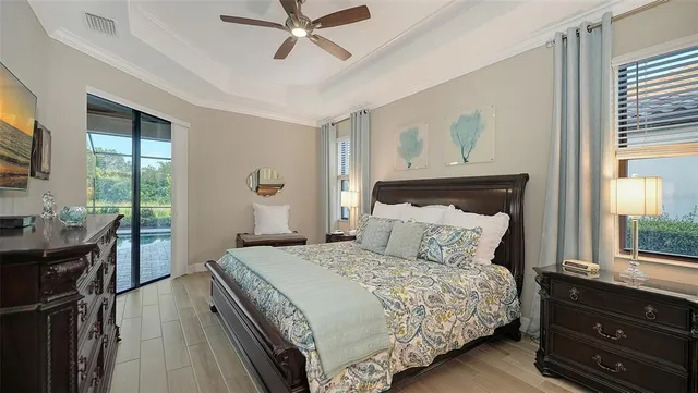 a bathroom with a granite countertop double vanity sink and a mirror