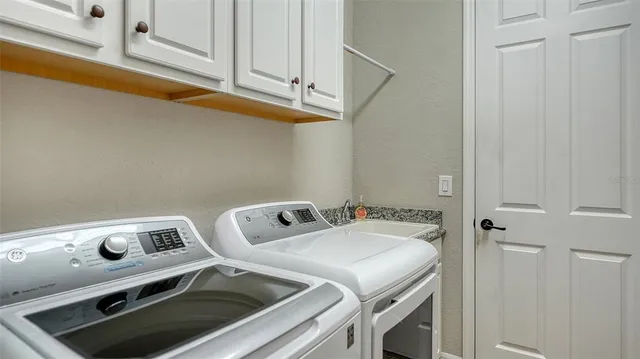 a view of an outdoor dining space with furniture