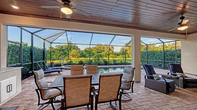 a room with furniture and a large window