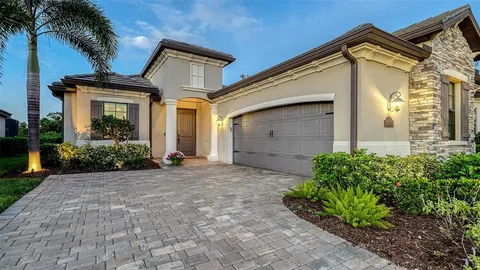 a bathroom with a sink vanity and a mirror