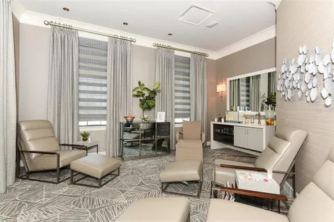 an aerial view of a house with a garden