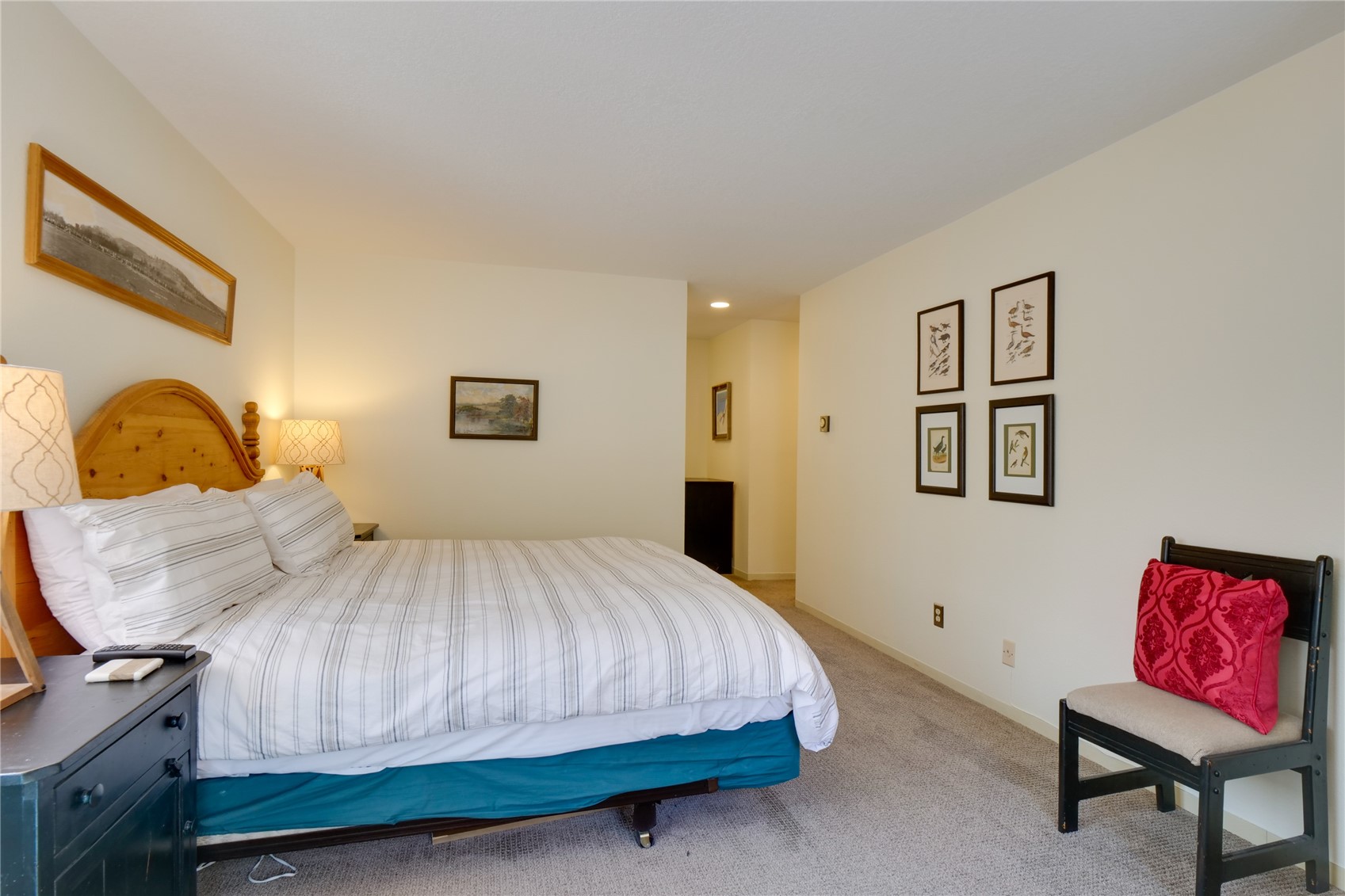 180 Tennis Club Road, Unit 1655 Keystone, CO 80435 - Photo 25 of 48 a bedroom with a bed and dresser