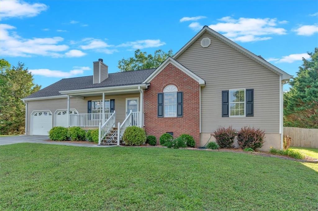 810 Baldwin Road Rockmart, GA 30153 - Photo 1 of 1 a front view of a house with garden