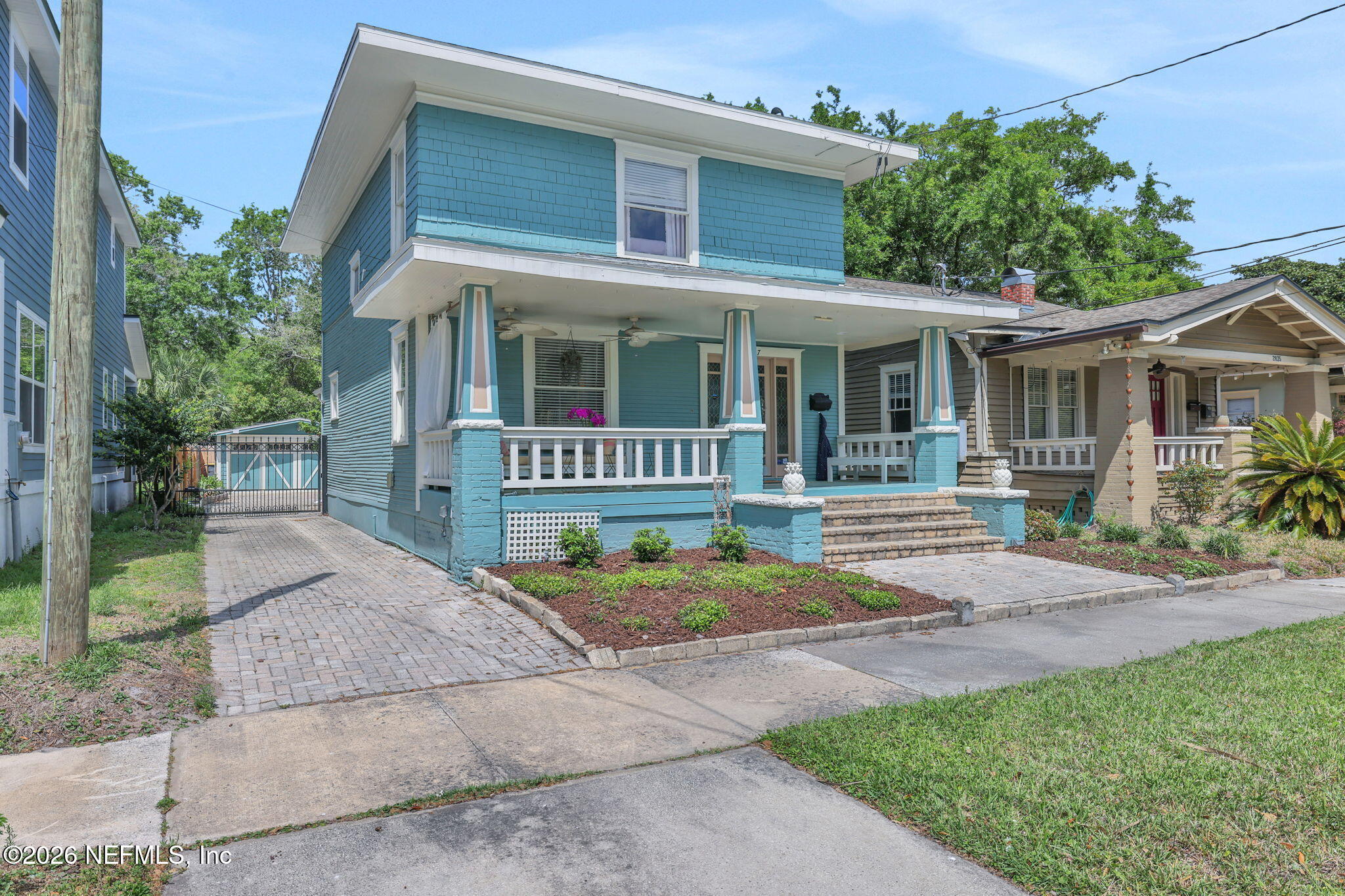 2837 Post Street Jacksonville, FL 32205 - Photo 1 of 70 a front view of a house with a yard