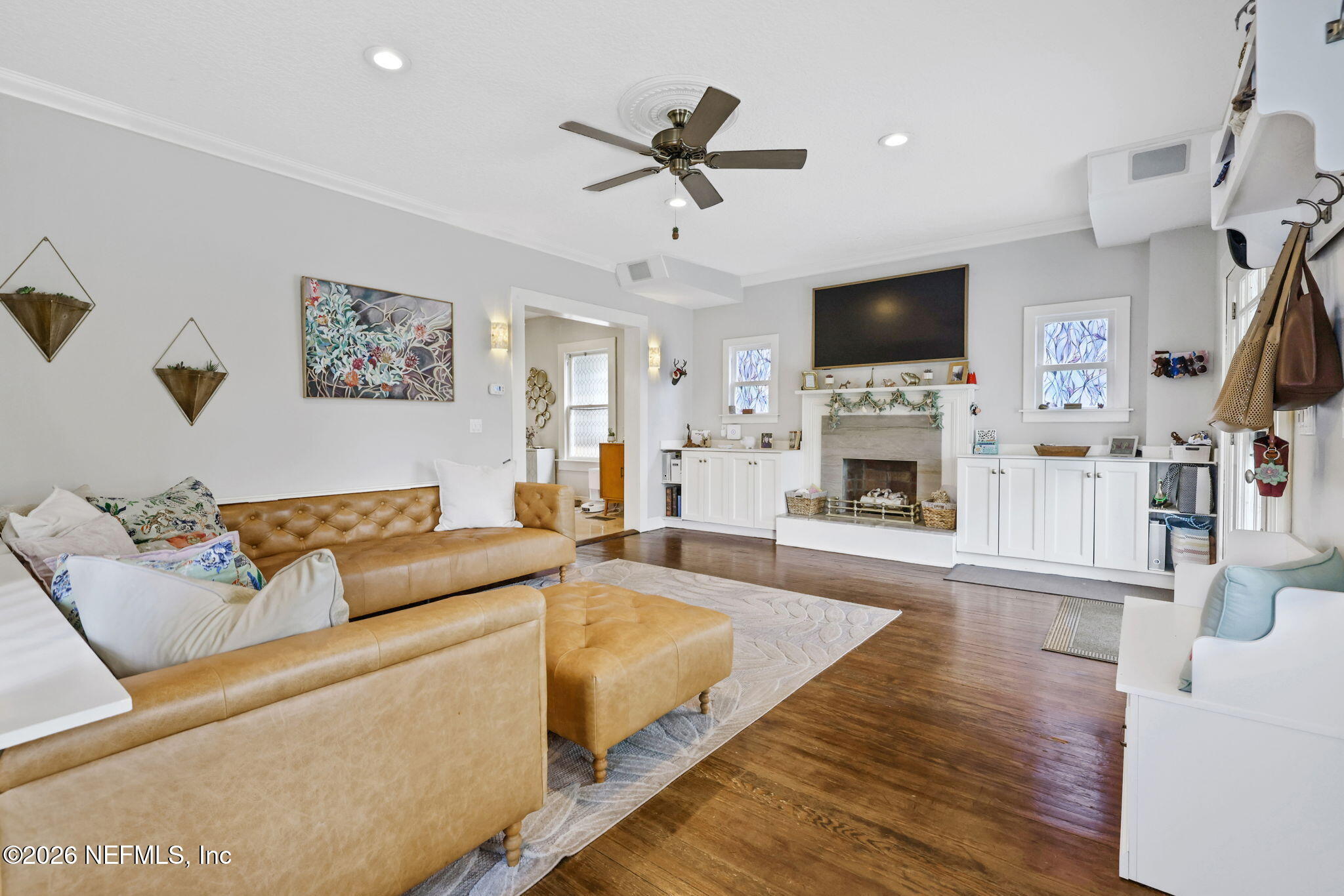 2837 Post Street Jacksonville, FL 32205 - Photo 14 of 70 a living room with furniture fireplace and a flat screen tv